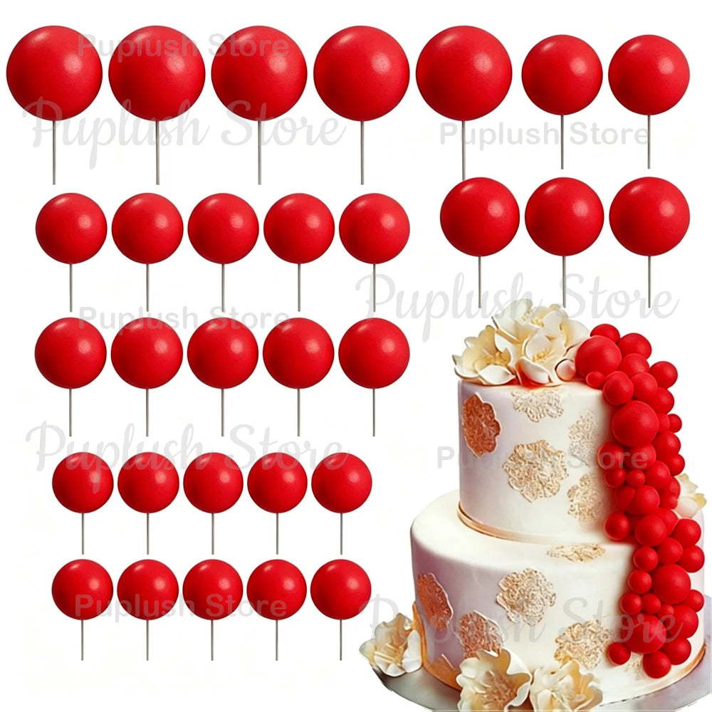 A set of red foam cake toppers, including round and petal shapes, displayed on white sticks.