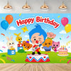 A colorful cartoon animal birthday decoration set featuring a character and balloons on a green field.
