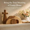 Wooden Easter empty tomb scene decoration featuring a cross and an open tomb with flowers and a Bible.