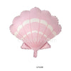 Pink mermaid tail foil balloon decoration with dolphin and seashell accents