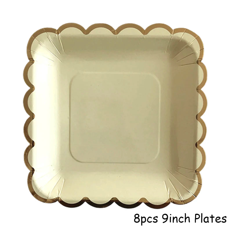 Eight 9-inch gold disposable plates with scalloped edges.