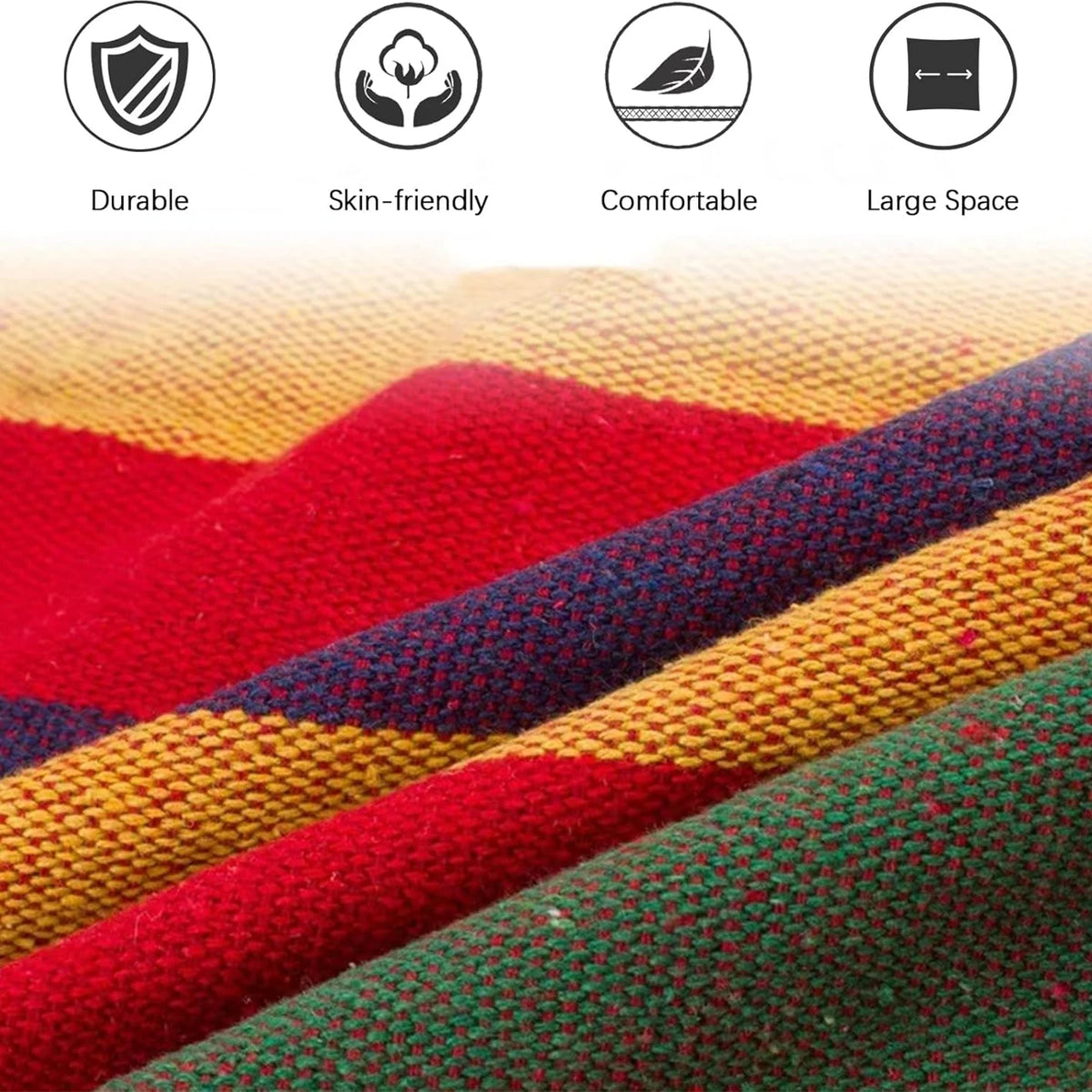 Close-up of a colorful canvas camping hammock fabric showing various red, yellow, and green stripes.