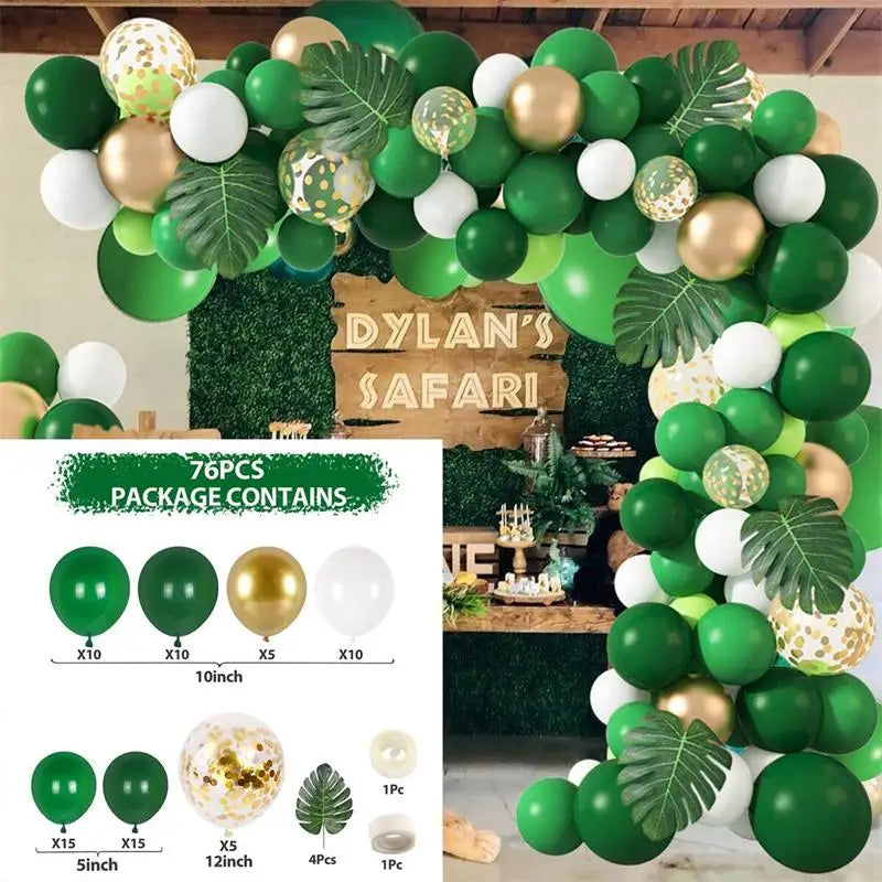 A green and gold jungle safari birthday decor set featuring various balloons and greenery.