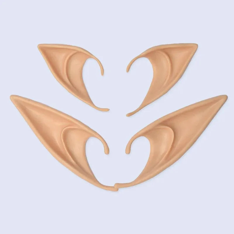 Ein Paar Vampir-Zahnschiene-Modelle in hellem Tan aus Vogelperspektive.