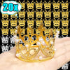 A golden crown made of gold-colored material decorated with white pearls, shown on a hand.