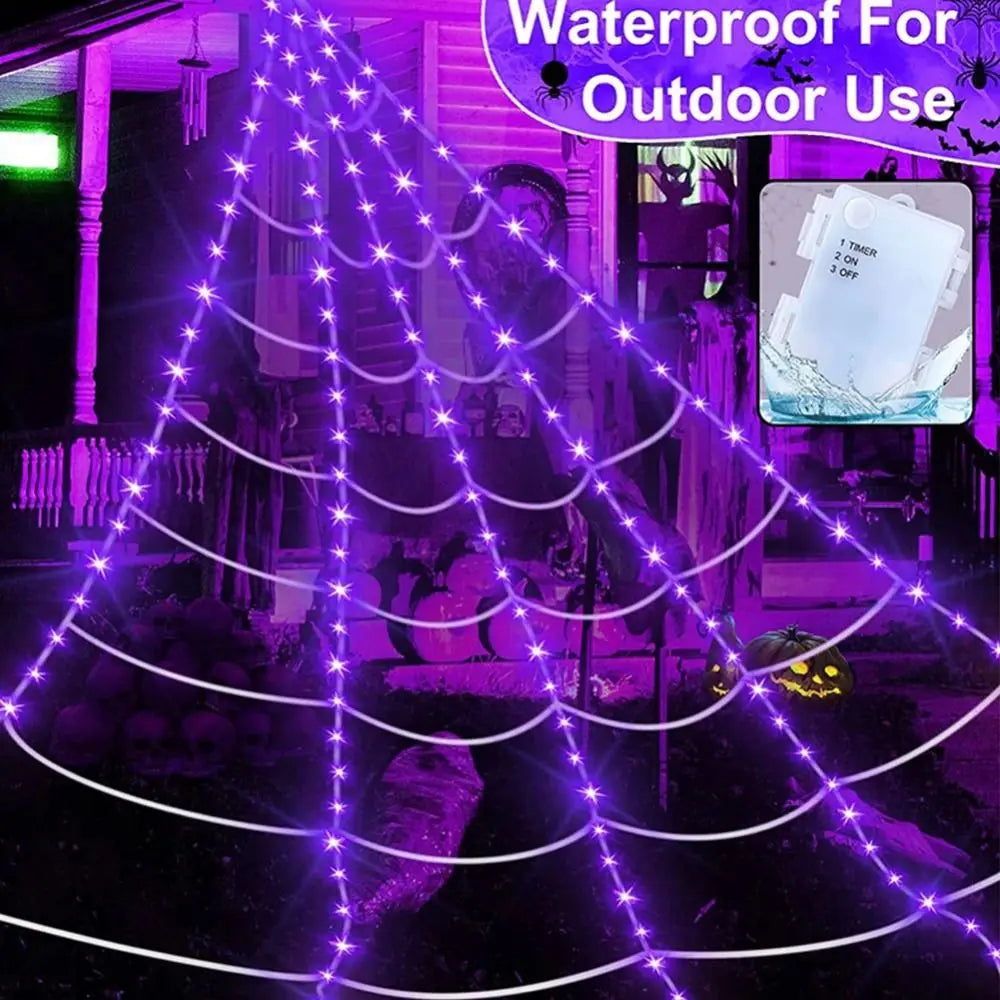 Purple waterproof giant spider web LED lights illuminating an outdoor area.