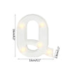 A white alphabet letter light shaped like the letter Q with warm white LED lights.