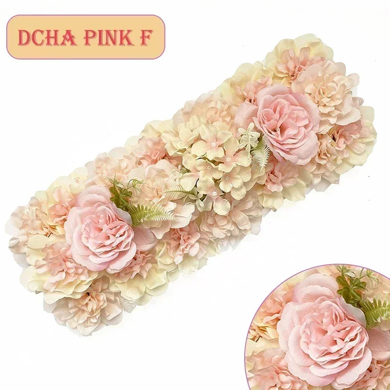 A long panel of pink and cream artificial silk rose flowers used for weddings and events.