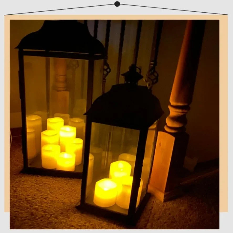 A black glass lantern holds several glowing yellow LED flickering candles on a carpeted surface.