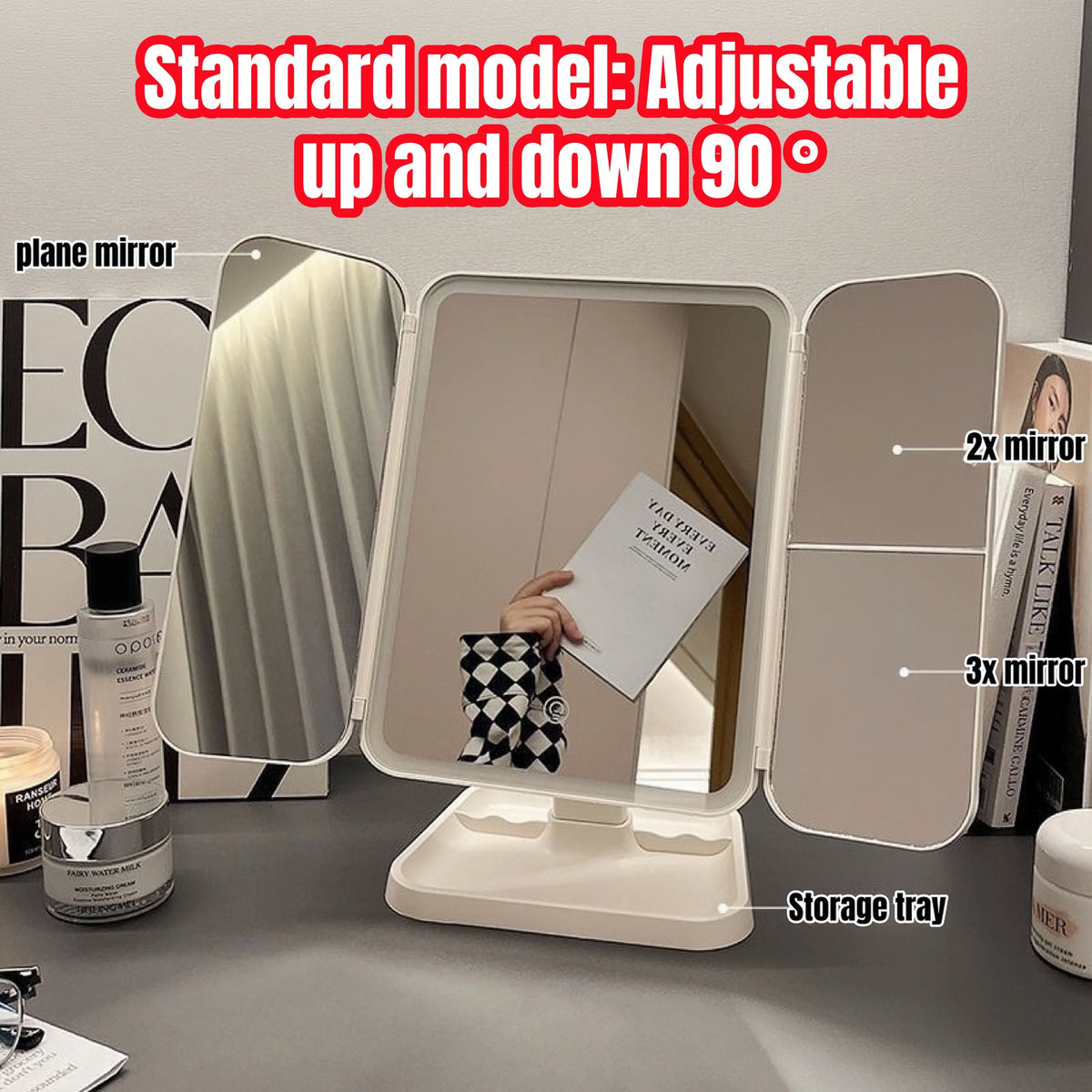 A standard adjustable makeup mirror with a storage tray and multiple mirror options is displayed on a table.