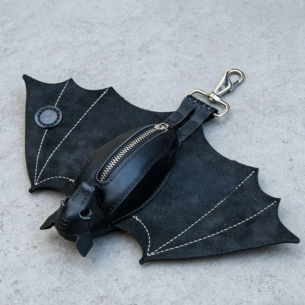 Black leather bat-shaped wallet and keychain with a zipper coin purse