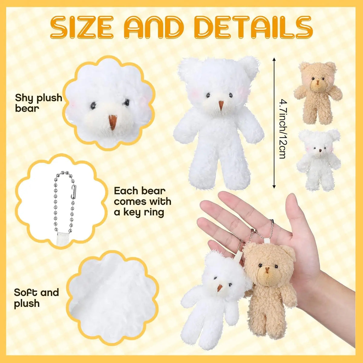 A set of white and tan plush teddy bears with key rings shown next to a hand.