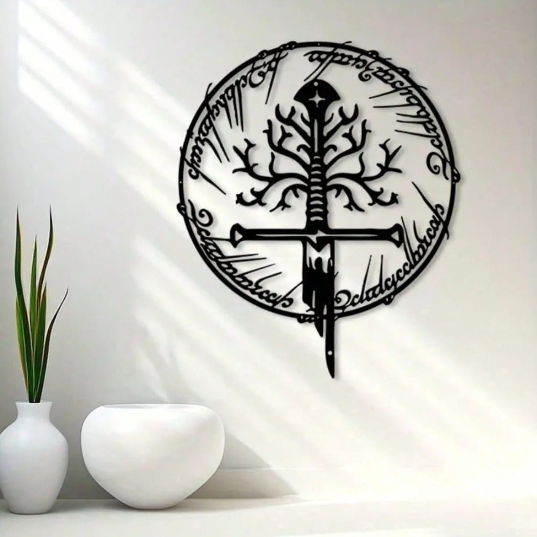 Vintage metal wall art depicting a sword design within a circular border.