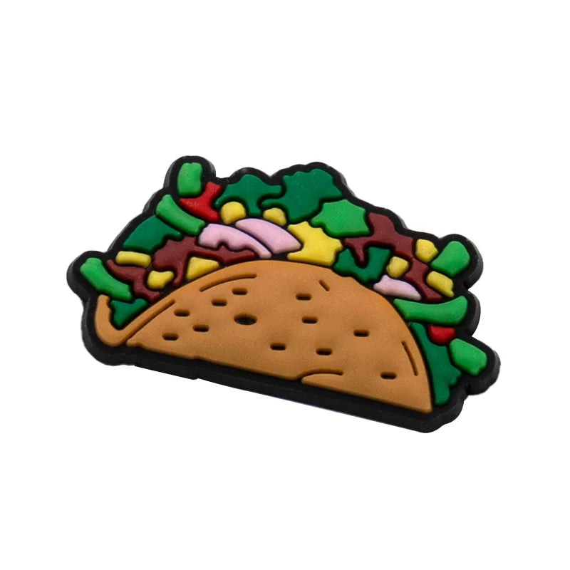 A colorful PVC shoe charm shaped like a hamburger with lettuce and toppings.