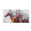 Abstract painting of two horses galloping with vibrant colors on canvas