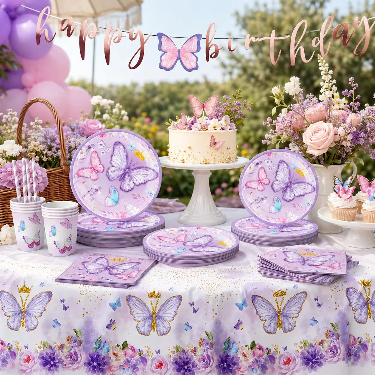 A butterfly theme disposable party set featuring pink and purple butterflies on a cake, plates, and decorations.