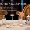 A dinner table setting featuring small tea lights and floral decor creating a romantic atmosphere.