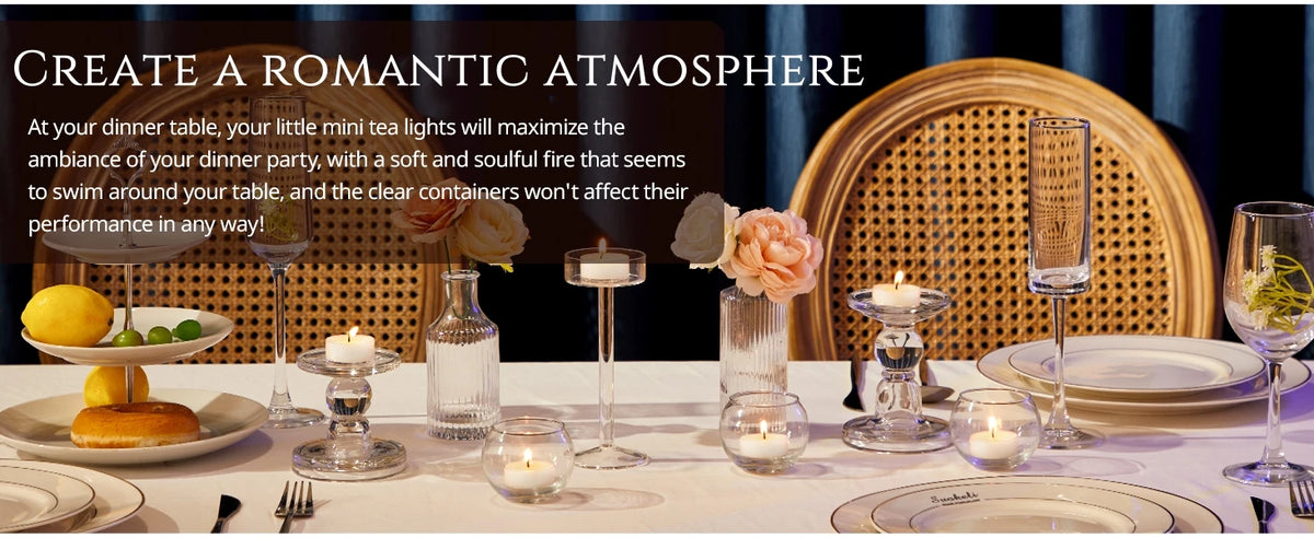 A dinner table setting featuring small tea lights and floral decor creating a romantic atmosphere.