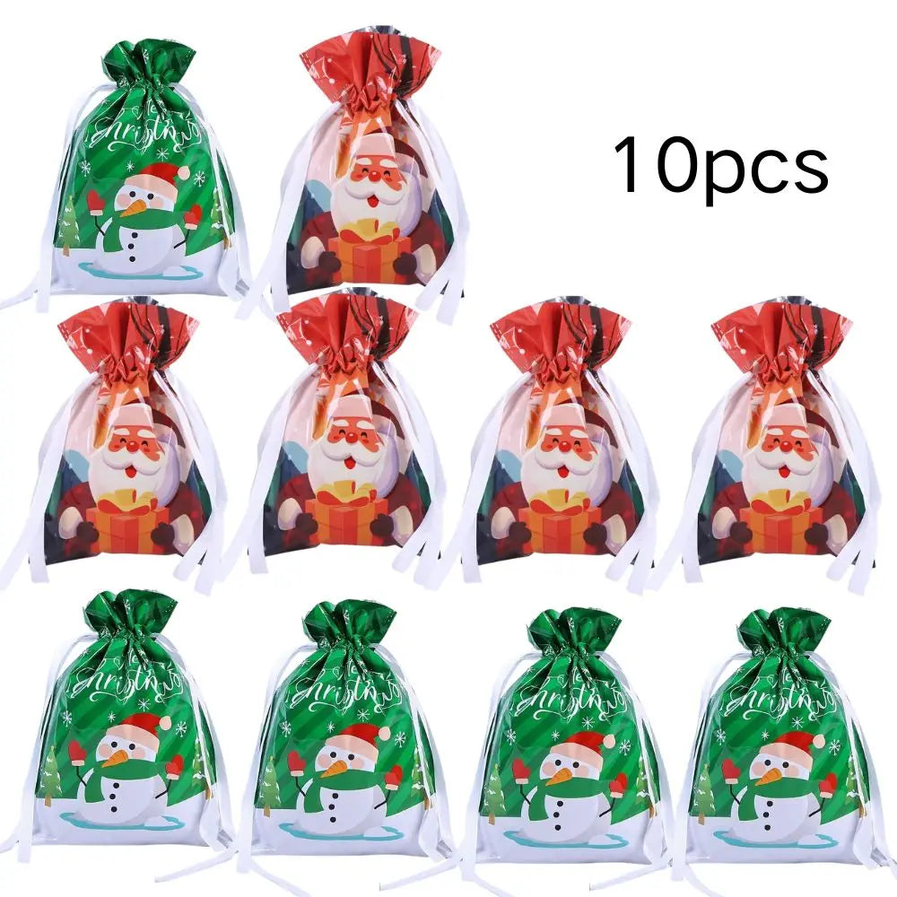 Ten reusable drawstring gift bags with a Christmas snowflake design in green and white.
