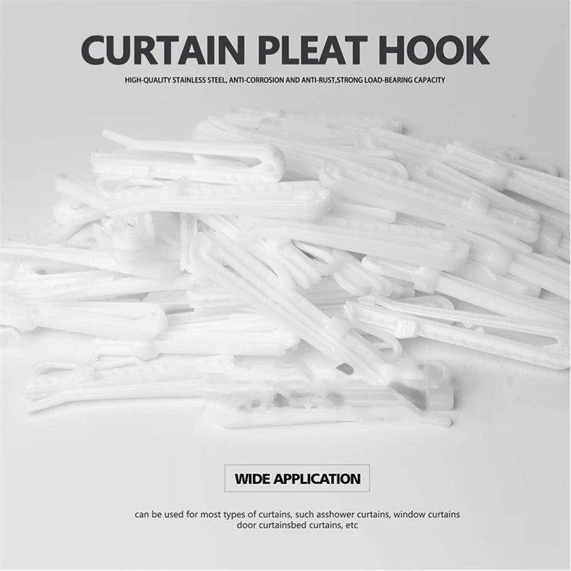 A pile of white curtain pleat hooks made of high-quality stainless steel for use in various curtains.