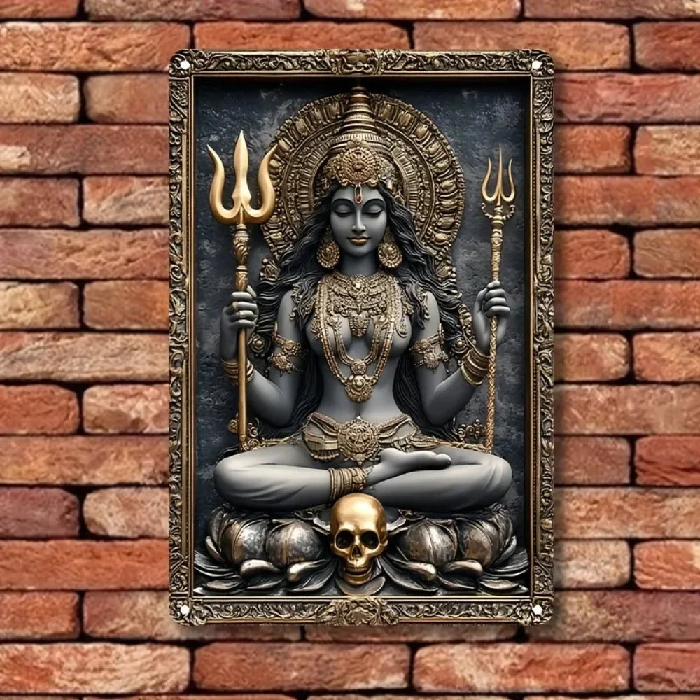 A dark metal statue of Goddess Durga with multiple arms, seated on a skull, set in a decorative frame.