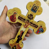 Handcrafted wooden Orthodox cross wall decor featuring religious iconography and Cyrillic text