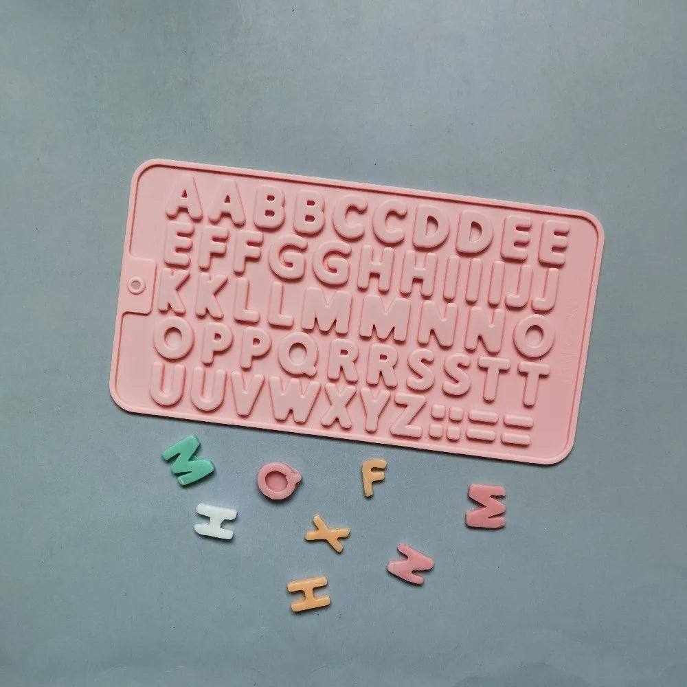A pink silicone mold set featuring uppercase letters and numbers for baking