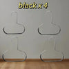 Four black metal hat organizer racks hanging on a white wall.