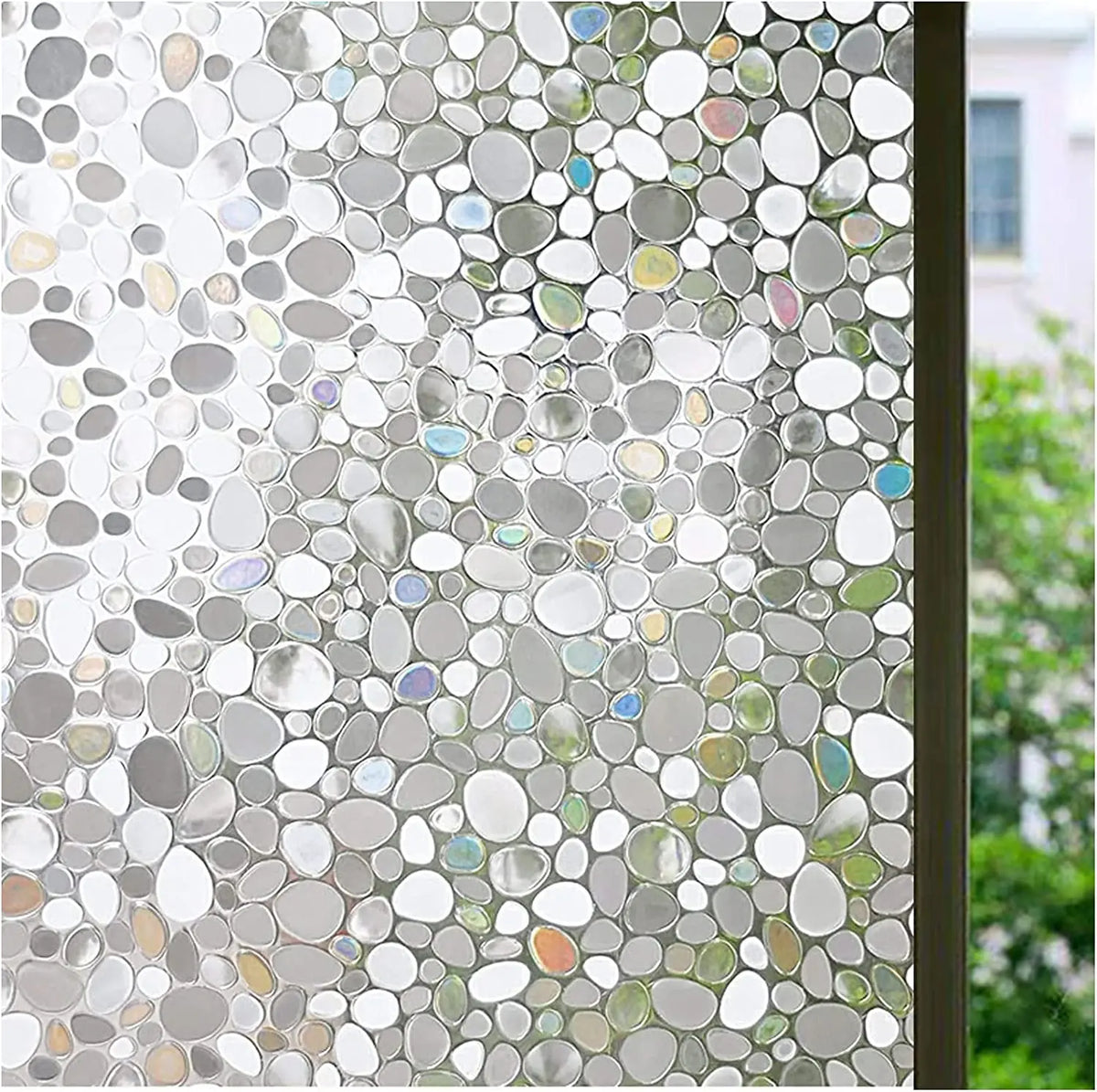 Close-up of frosted window privacy film with iridescent, bubbly texture.