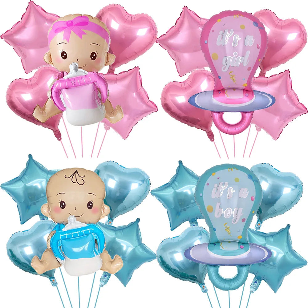 A set of pink and blue foil balloons shaped like baby bottles for a baby shower decoration