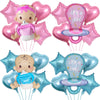 A set of pink and blue foil balloons shaped like baby bottles for a baby shower decoration