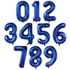 A set of large dark blue foil number balloons spelling out 0123456789 for party decor