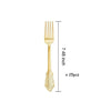 A set of elegant white and gold disposable dinnerware with cutlery, including forks.