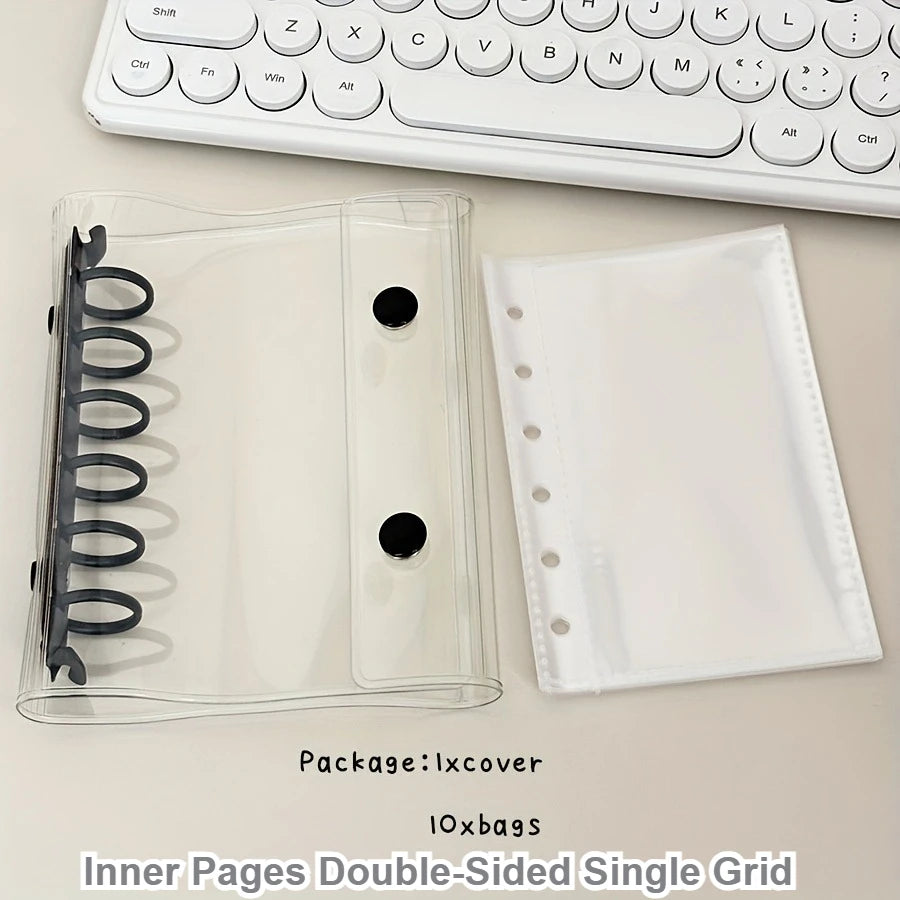 Clear plastic binder cover and inner pages with a single grid for organizing collectibles