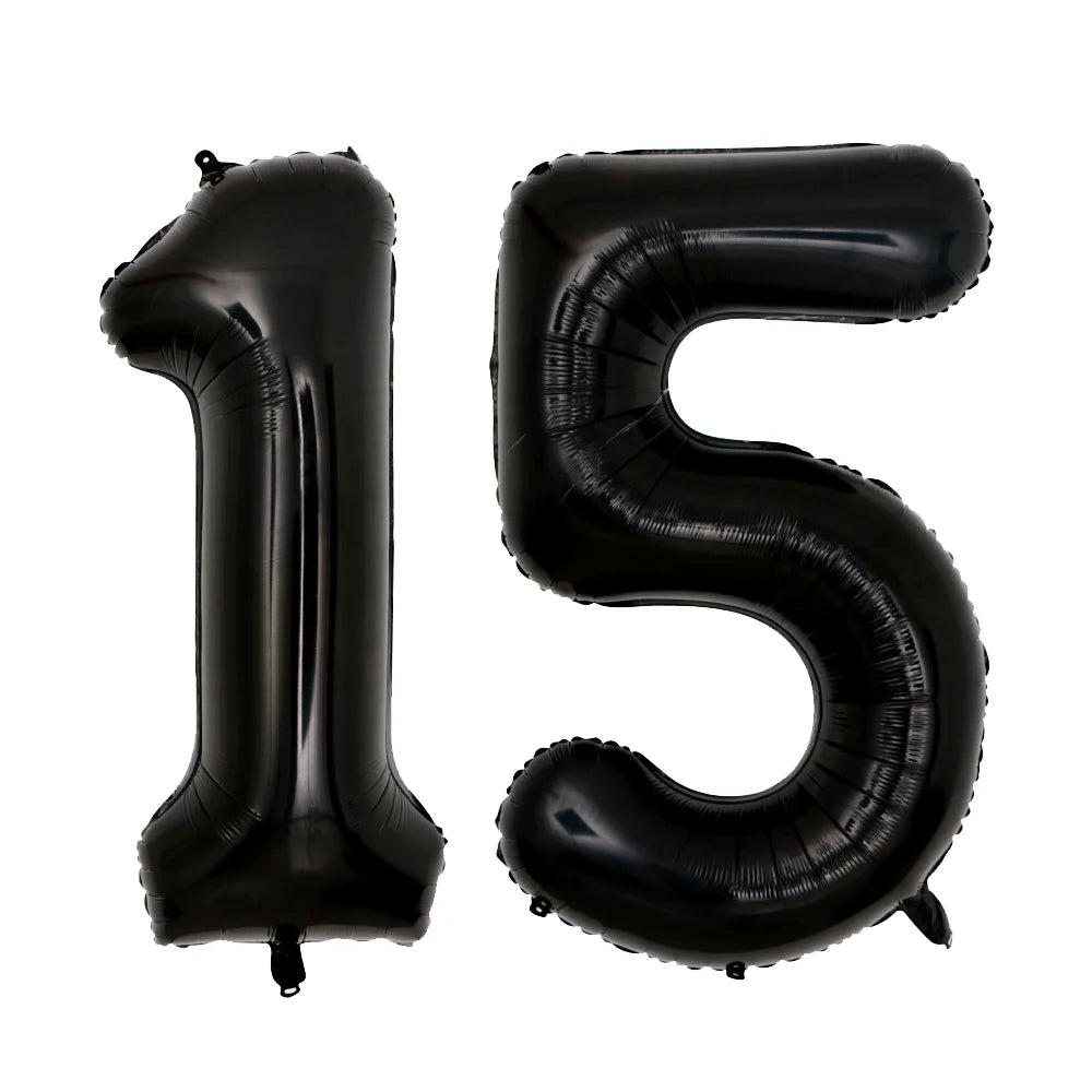 A set of two black foil balloons shaped like the numbers 1 and 5.