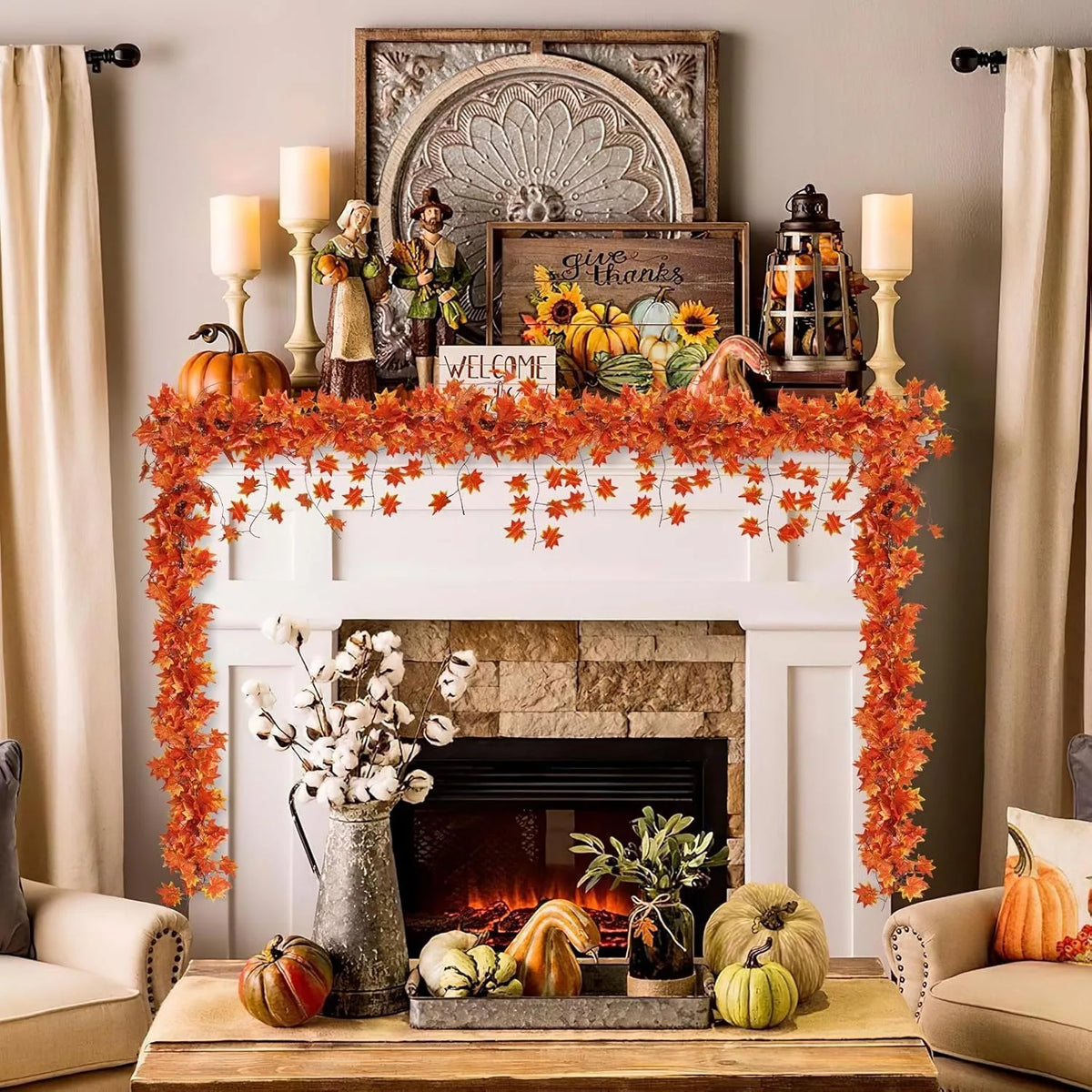 A rustic fireplace mantel decorated with an autumn harvest display featuring pumpkins, gourds, and an artificial maple leaf g