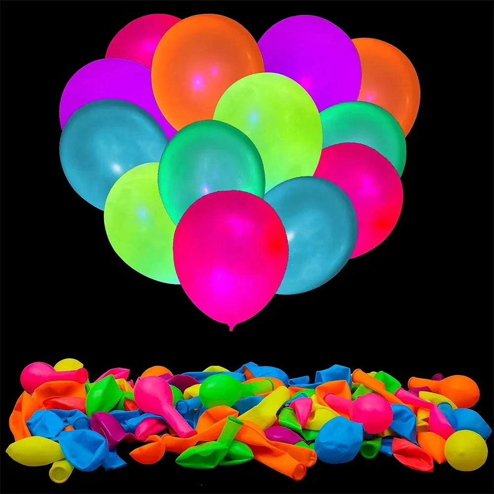 A collection of brightly colored neon glow latex balloons in various shades including pink, orange, green, and blue.
