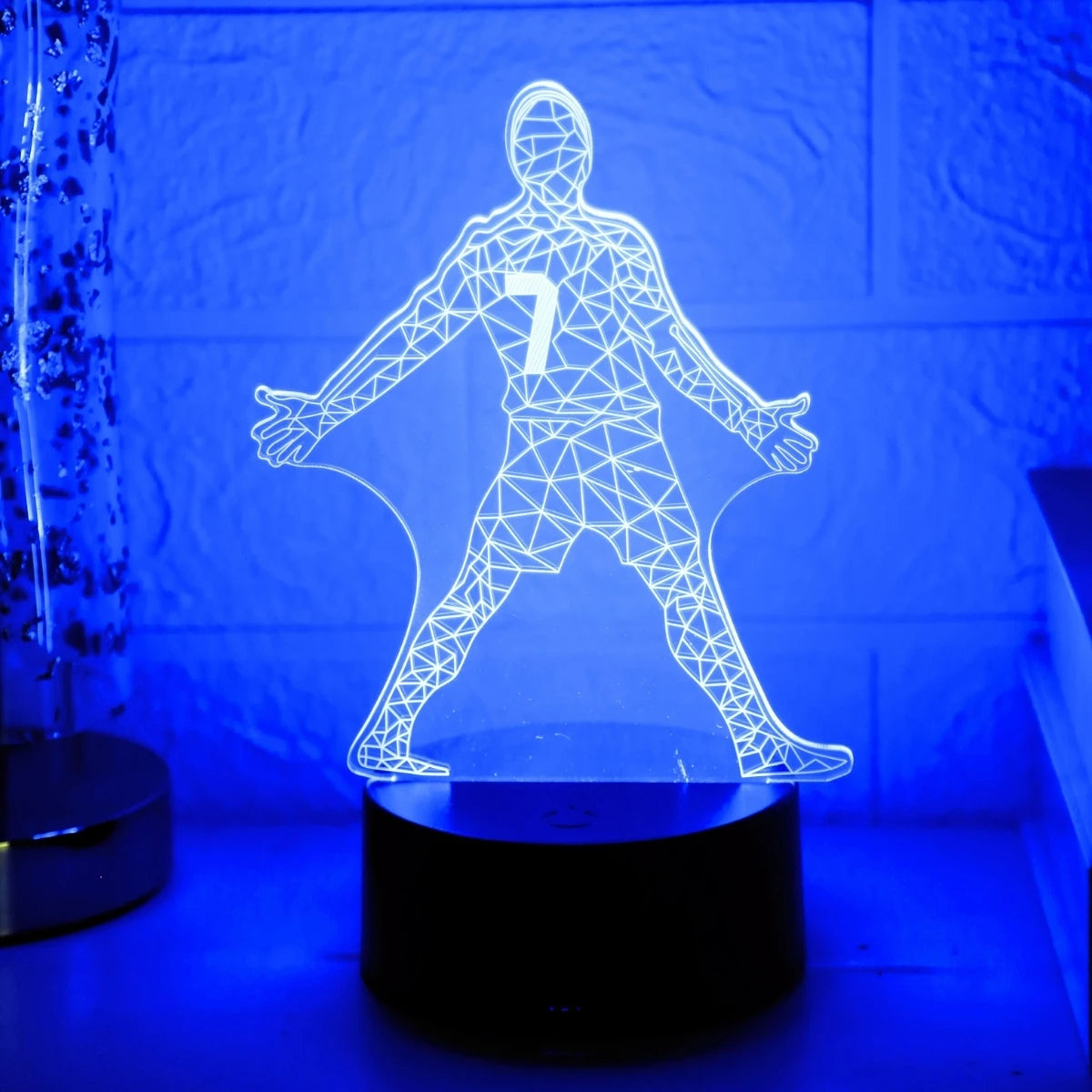 A glowing outline of a football player wearing number 7 illuminates against a blue background.