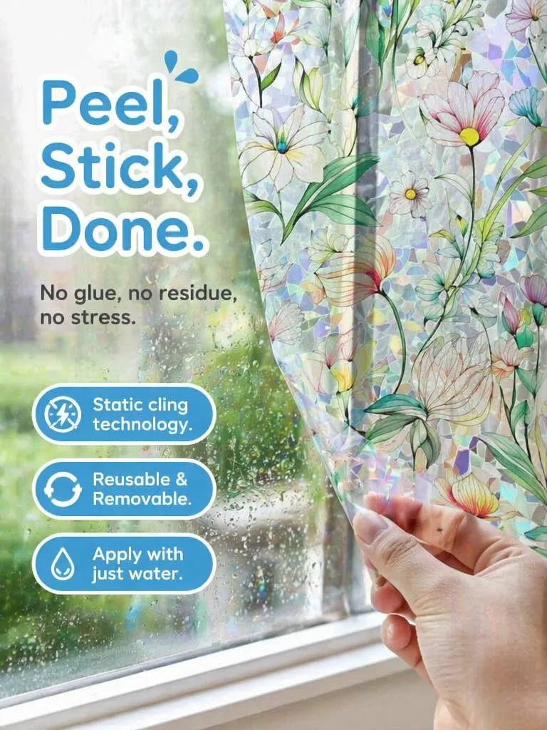 Hand applying peel stick done window film featuring vintage floral mosaic design for privacy and UV protection