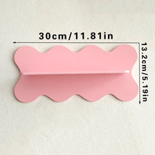 A pink cherry-shaped wooden wall shelf measuring 30cm or 11.81in.