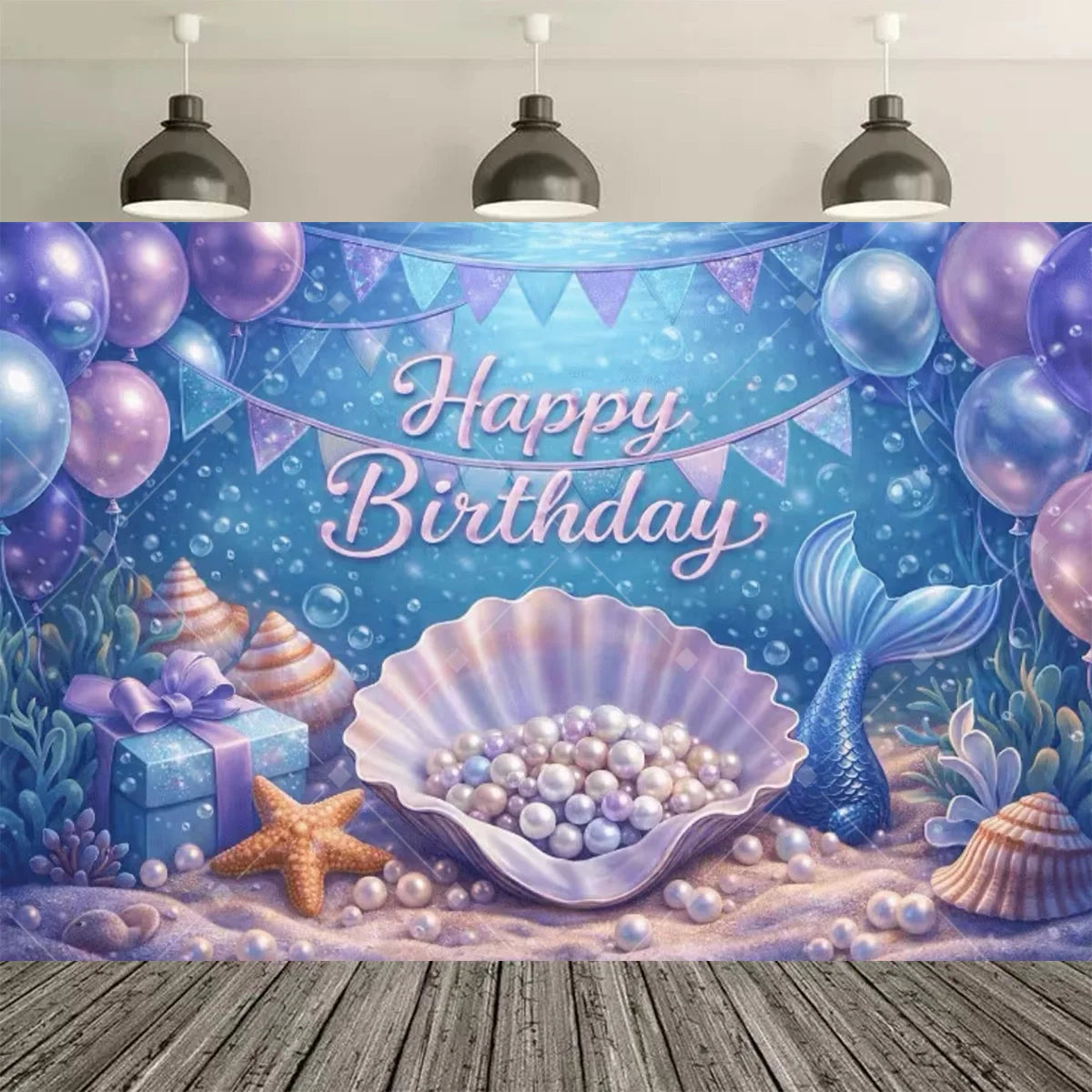 A vibrant blue and purple mermaid tail birthday backdrop featuring balloons, starfish, and seashells.