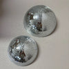 Silver disco ball sphere with a mosaic surface, shown in two views.