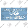 A rustic wooden sign with blue distressed paint that reads Don't be cross wash your hands