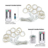 LED curtain fairy lights with 8 modes button and remote control shown with tangled wires