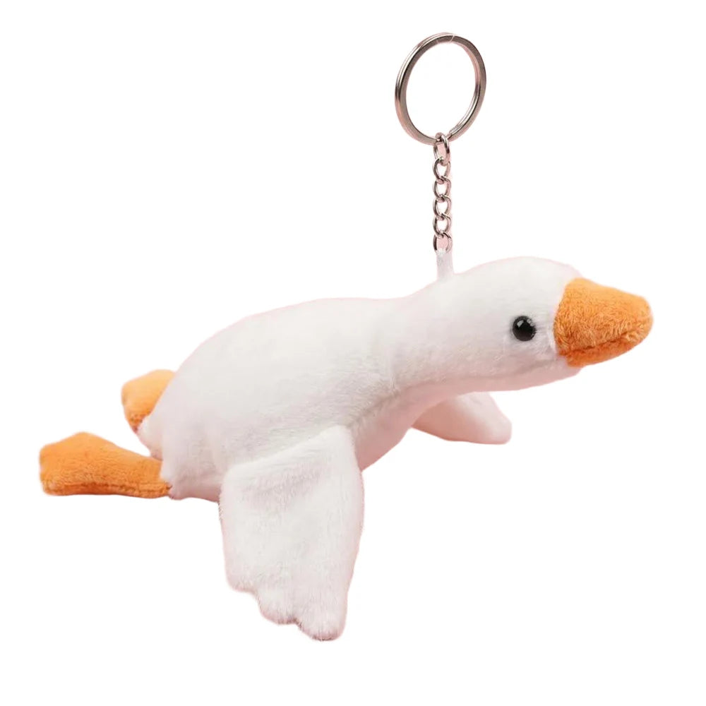 Adorable white duck plush keychain pendant with an orange beak and yellow feet