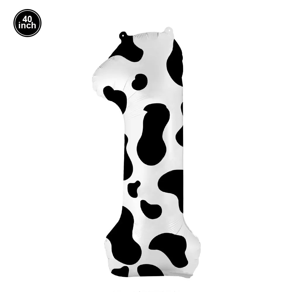 A white foil balloon shaped like a cow print for farm-themed parties.