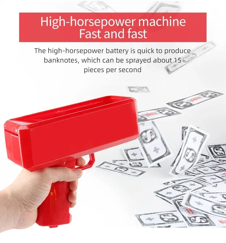 A hand holds a red money shooter toy spraying banknotes onto a surface.