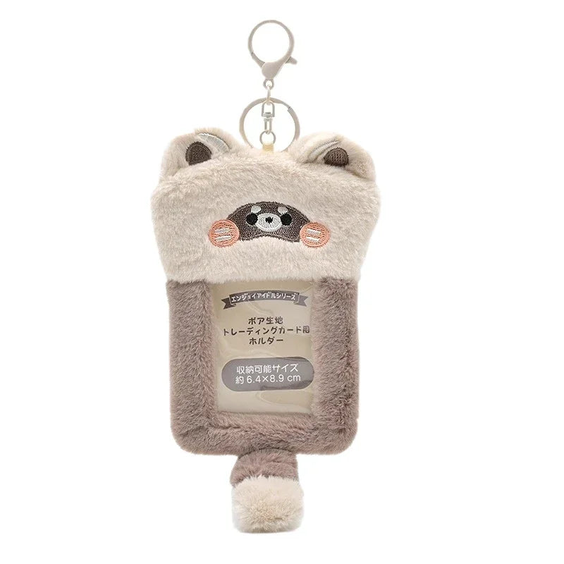 A fluffy bear-shaped keychain holder for Kpop photocards with a hanging loop.