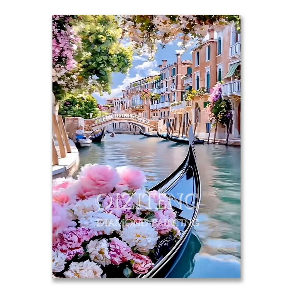 A diamond painting kit featuring a scenic view of European architecture and a pink flower arrangement on a boat.