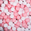 A close-up view of a 50-pack of colorful pink and white star-shaped balls for kids' play areas.
